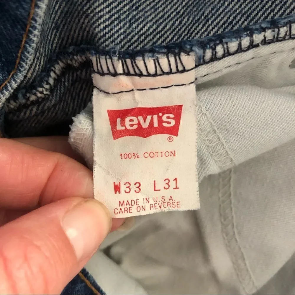 Vintage Levi’s 509 orange tag medium blue wash denim jeans size 33x31